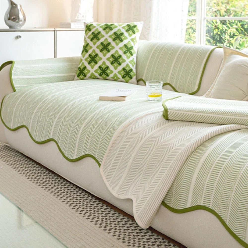 Sofaovertræk med sildebensmønster og bølgekant