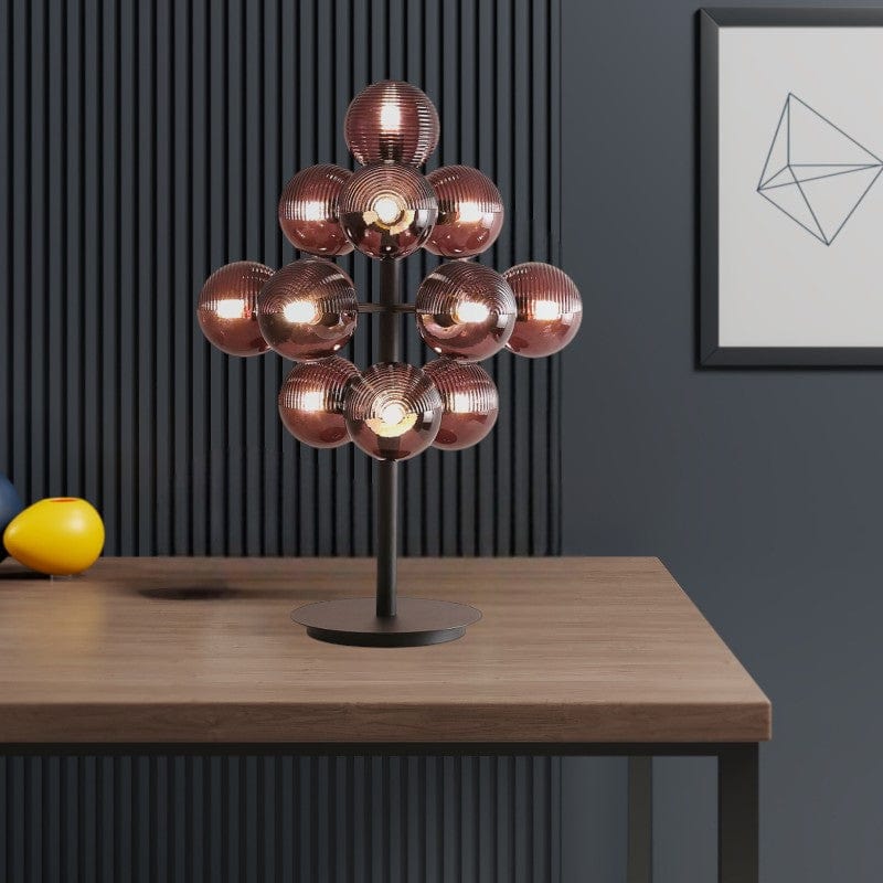 Bordlampe i metal og glas – elegant design med drueformet skærm
