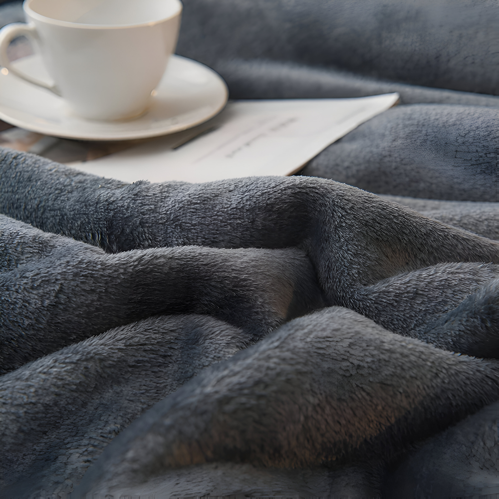 Dobbeltvendet vinterplaid i flannel og fleece