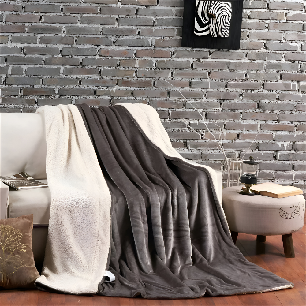 Dobbeltvendet vinterplaid i flannel og fleece