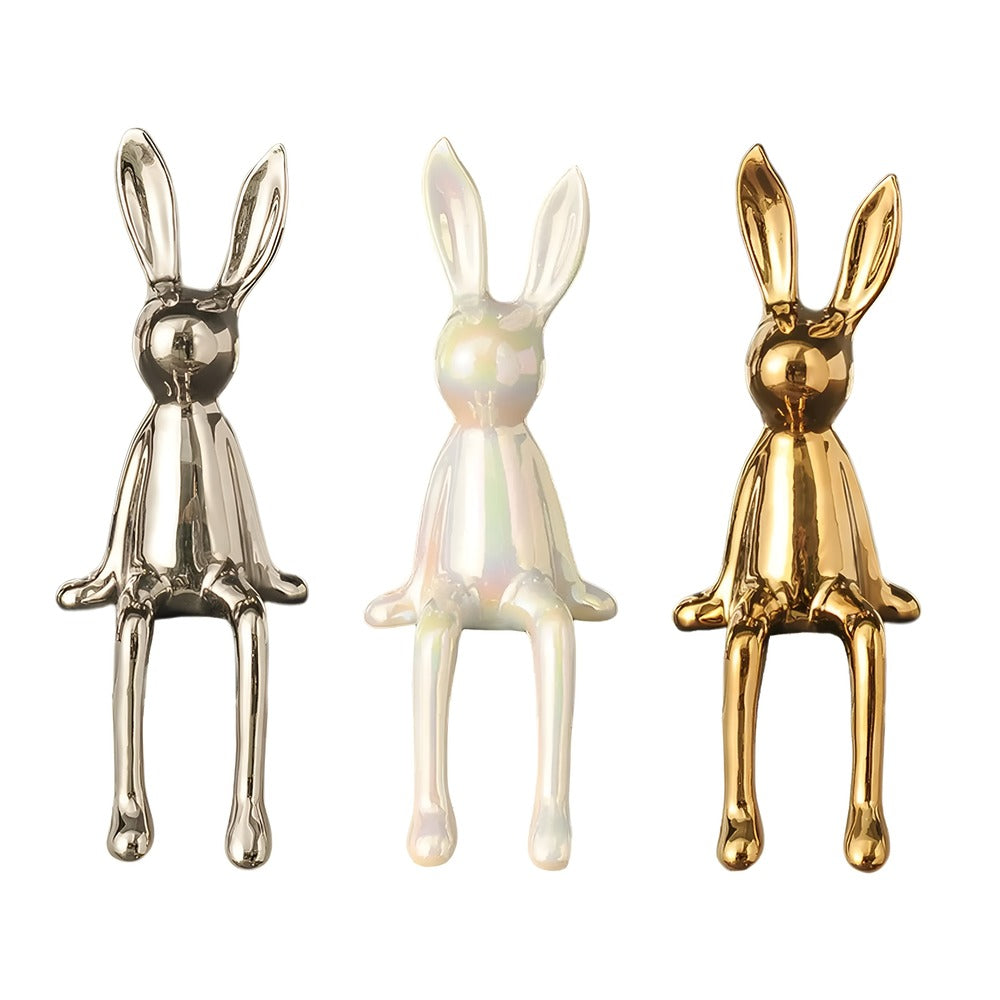 Dekorativ kaninfigur i guld keramik – elegant pynt til hjemmet