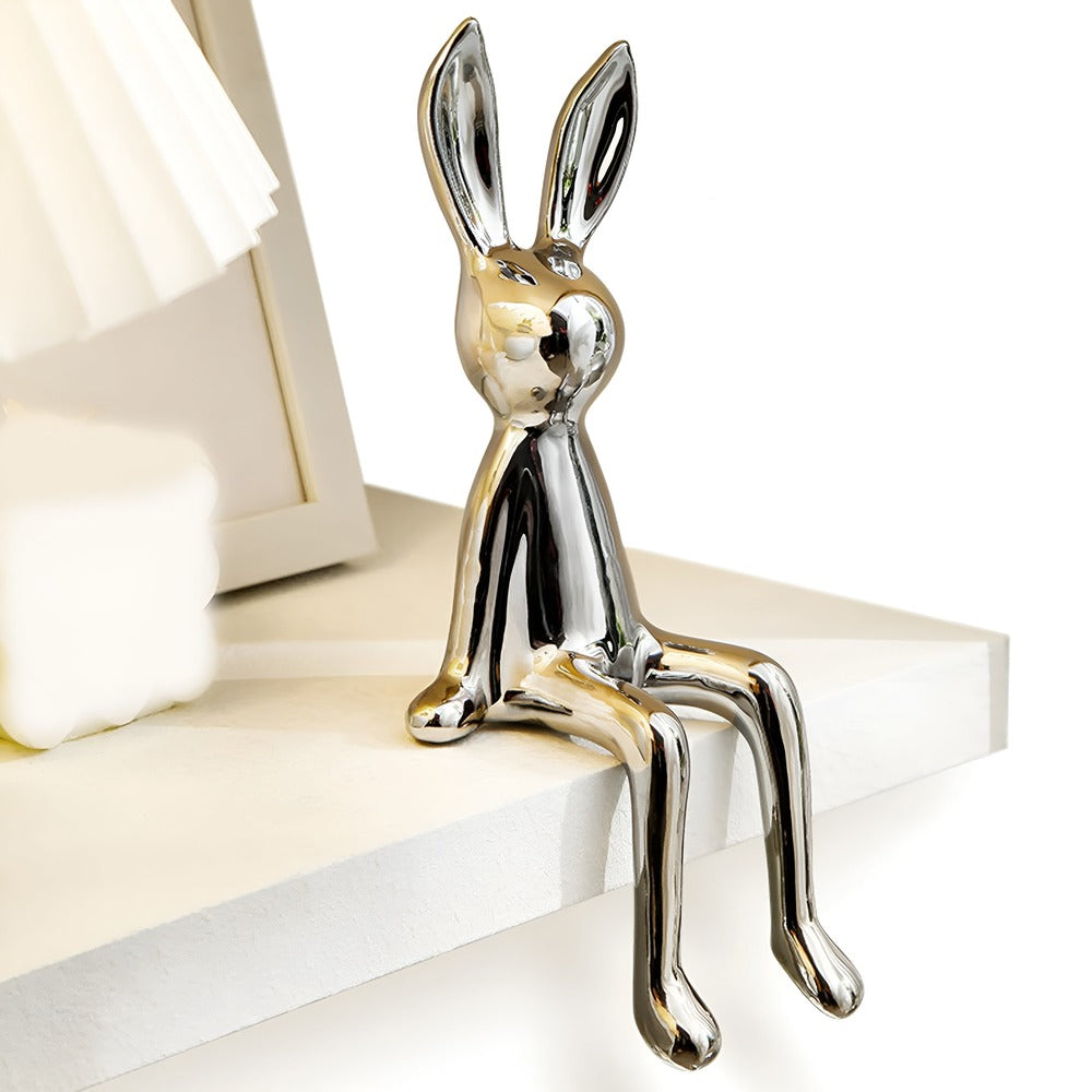 Dekorativ kaninfigur i guld keramik – elegant pynt til hjemmet