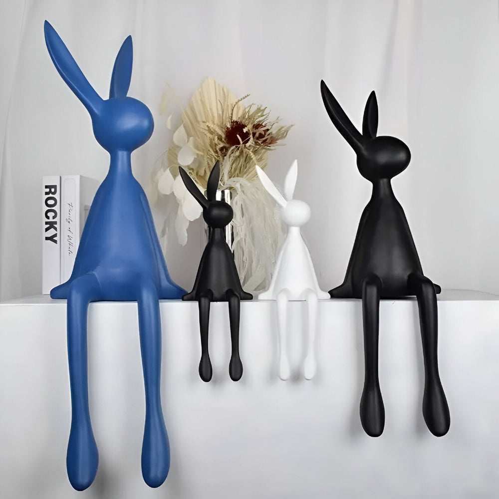 Dekorativ påskehare i moderne design – elegant siddende figur i resin