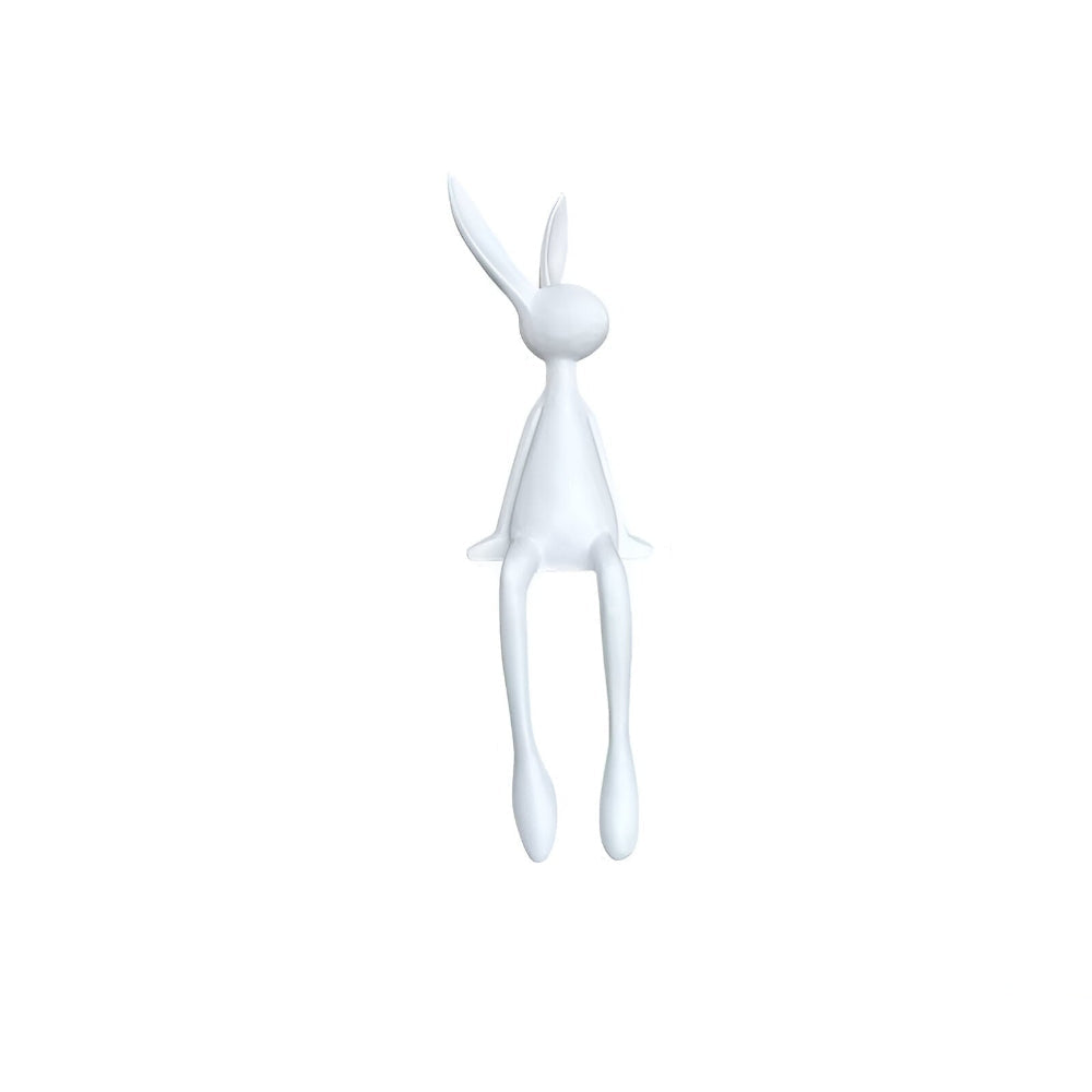 Dekorativ påskehare i moderne design – elegant siddende figur i resin