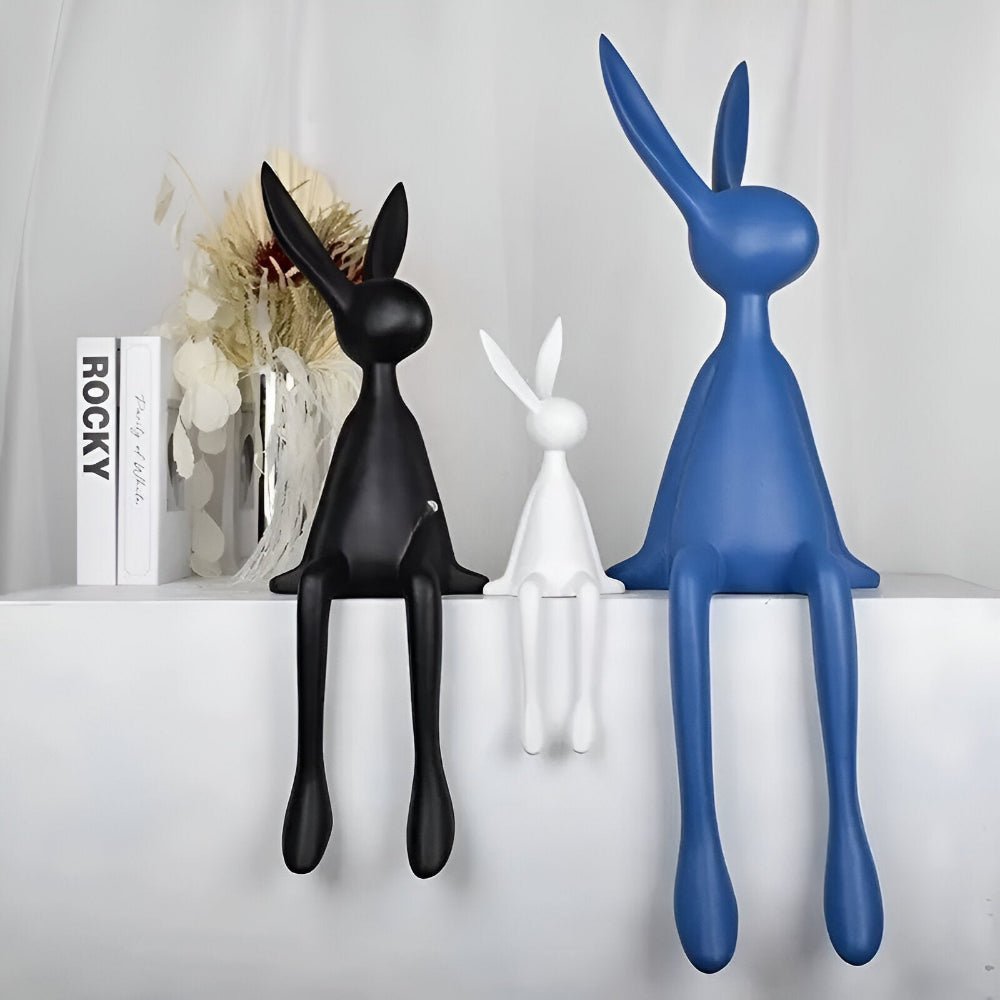 Dekorativ påskehare i moderne design – elegant siddende figur i resin