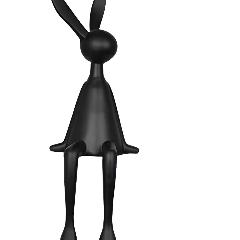Dekorativ påskehare i moderne design – elegant siddende figur i resin