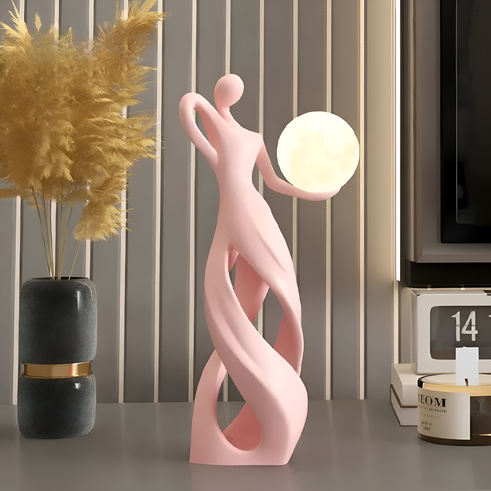 Dekorativ figur lampe i abstrakt design – moderne skulptur med varm belysning