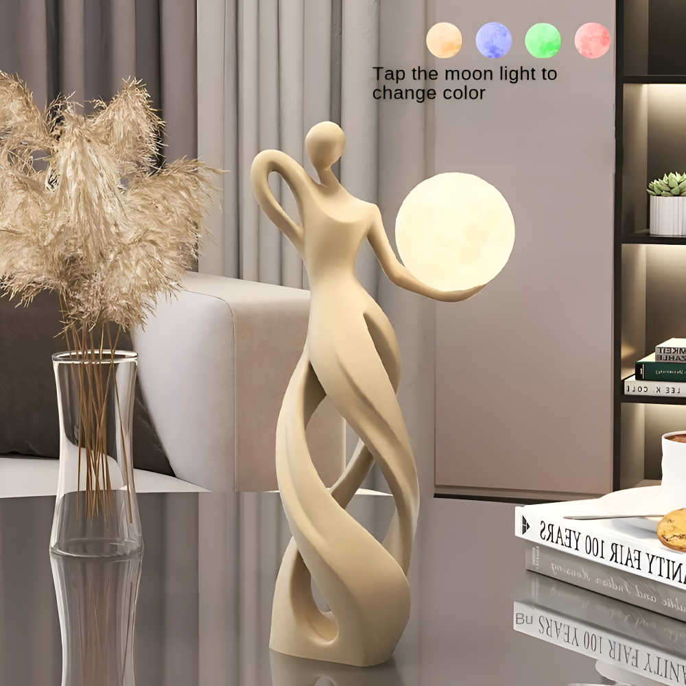 Dekorativ figur lampe i abstrakt design – moderne skulptur med varm belysning