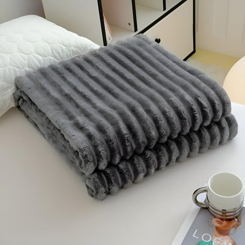 Tyk ribbet fleeceplaid til sofa og seng