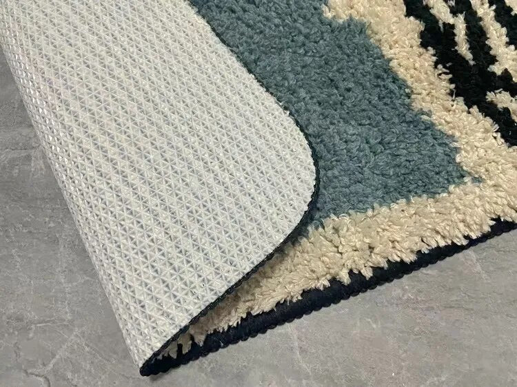 Skridsikker absorberende bademåtte med abstrakt design