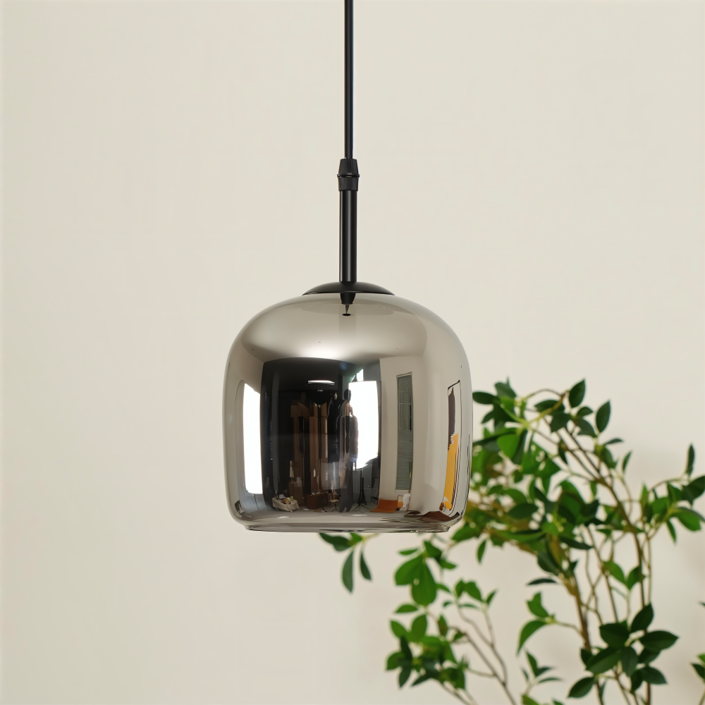 Pendellampe i sortgråt glas – elegant kelchdesign med varmt lys