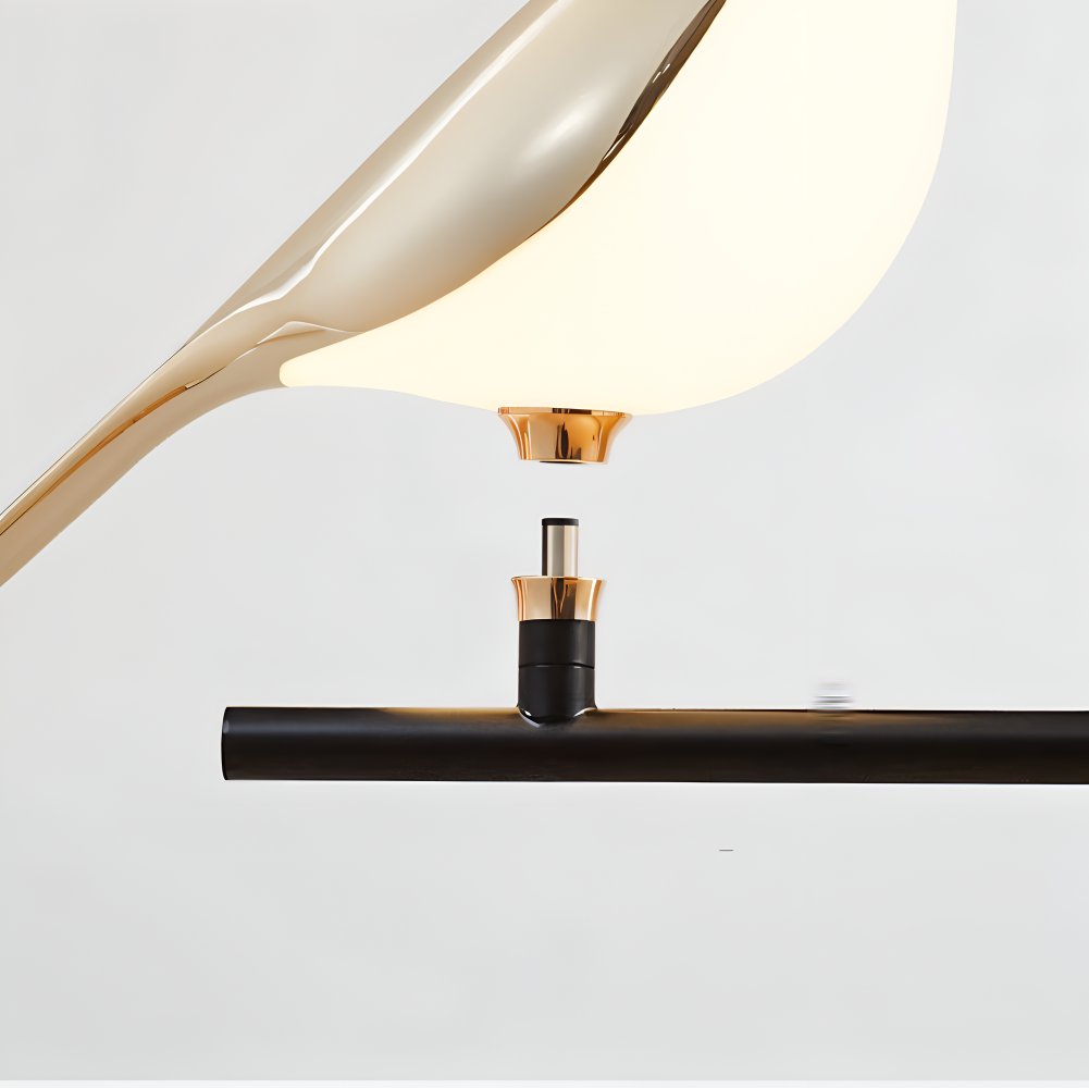 Orivelle – Guld Væglampe med Roterende Fugledesign og LED-lys