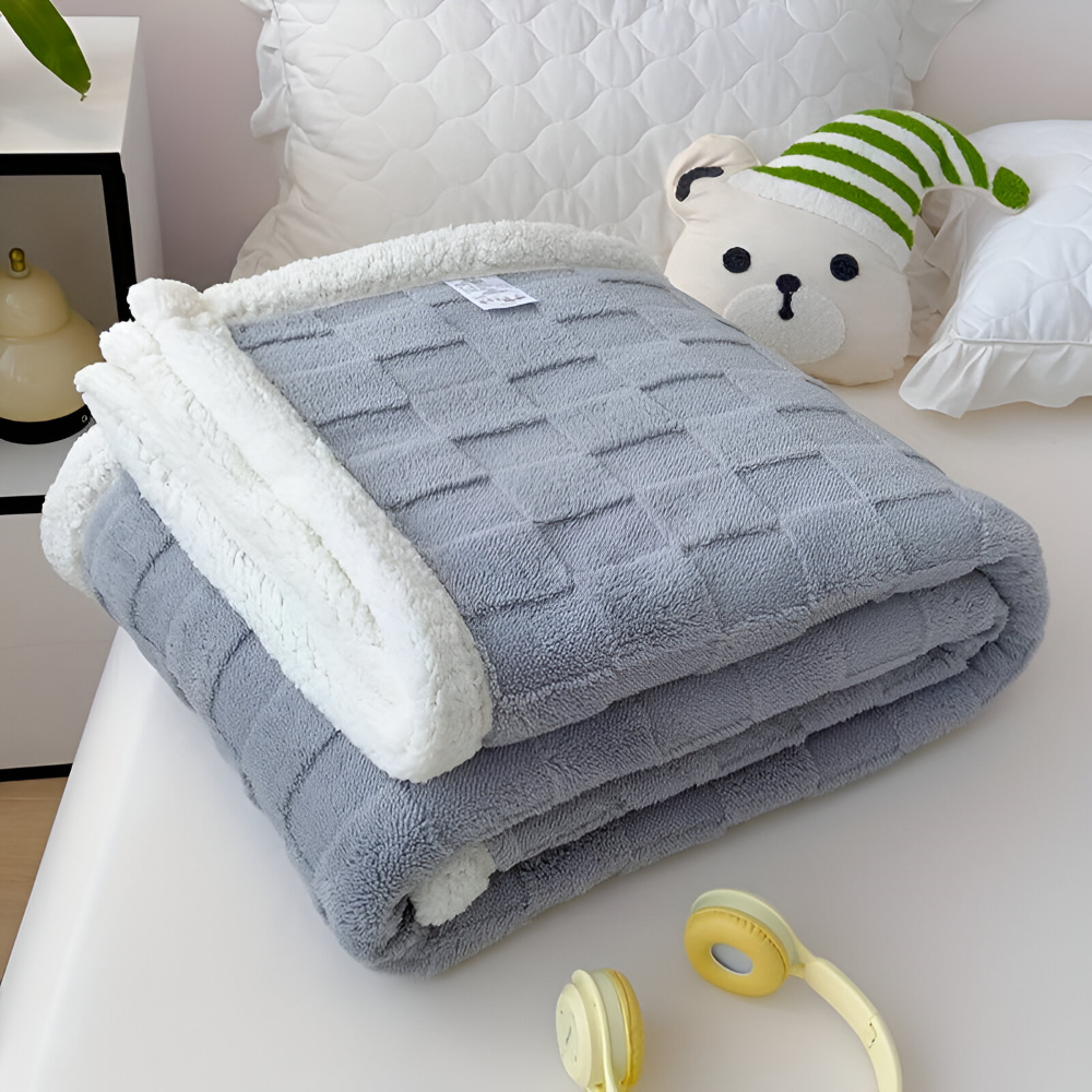 Vendbar fleeceplaid – tyk og varm vinterplaid med ternet design