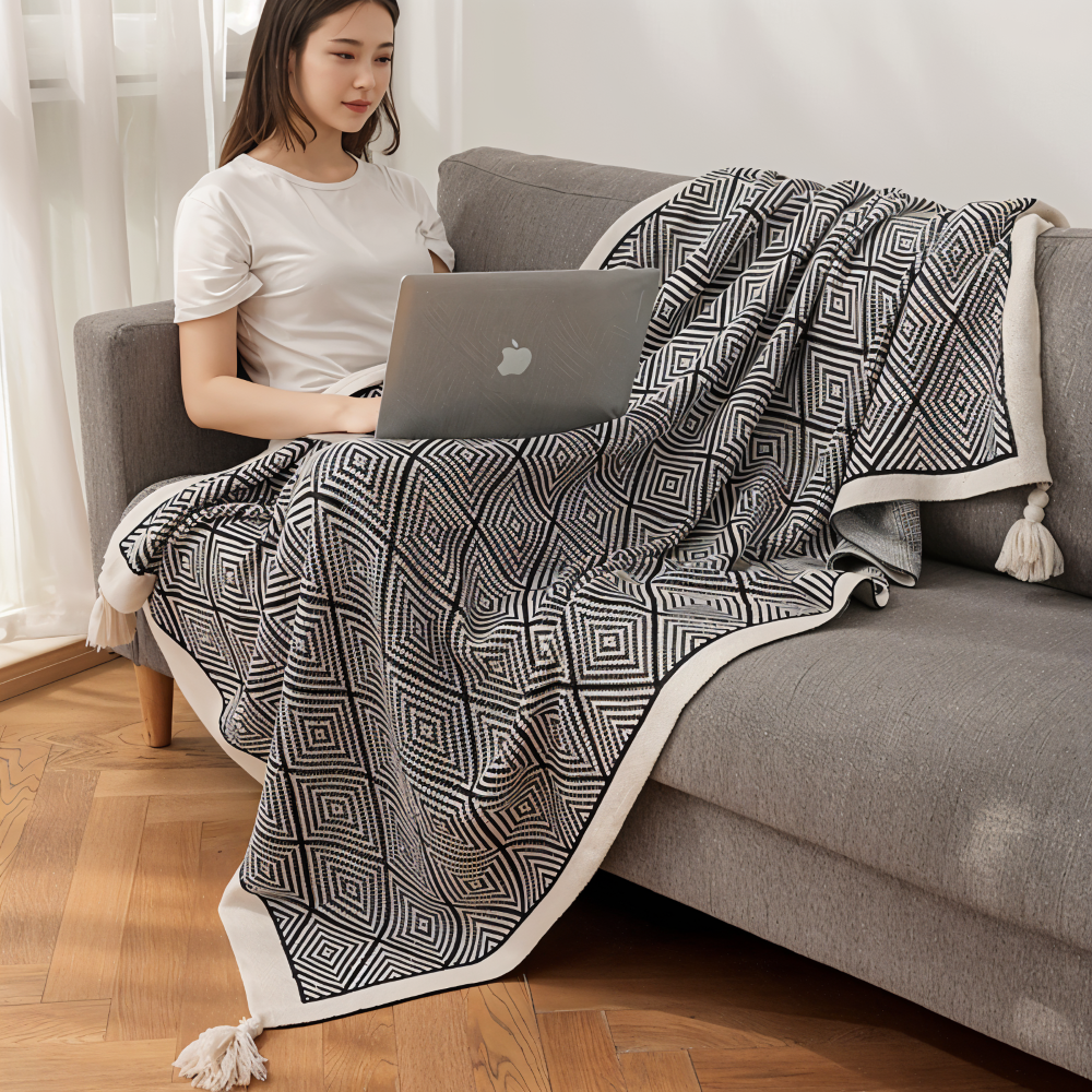 Geometrisk fleeceplaid i sort og hvid