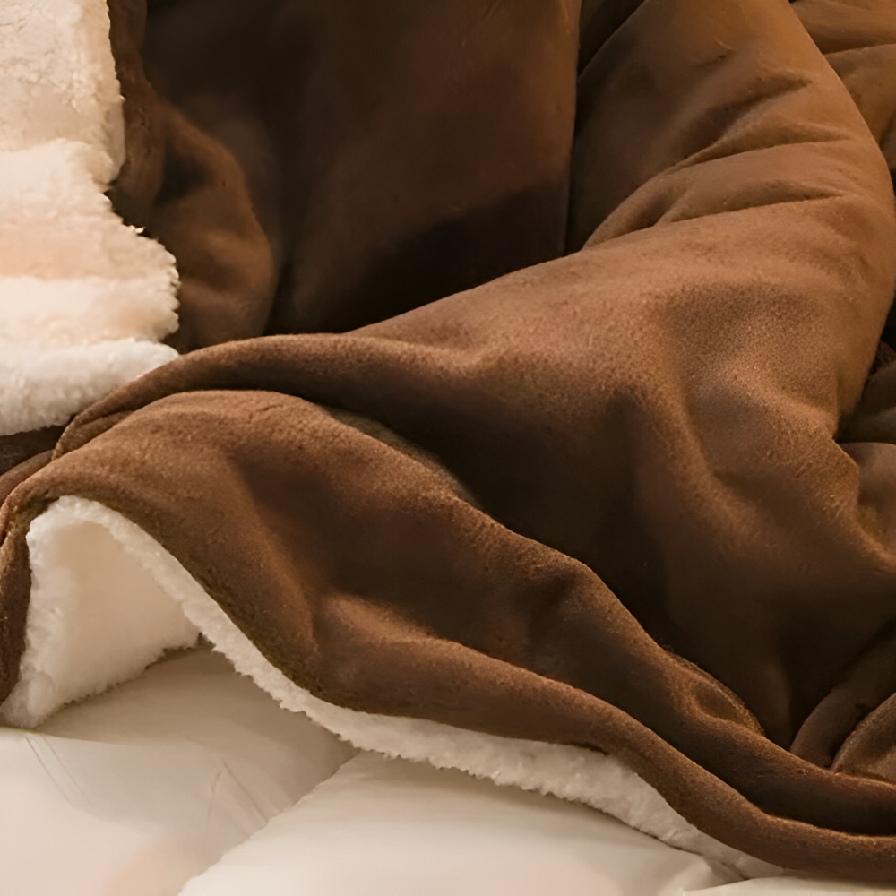 Dobbeltvendet vinterplaid i flannel og fleece