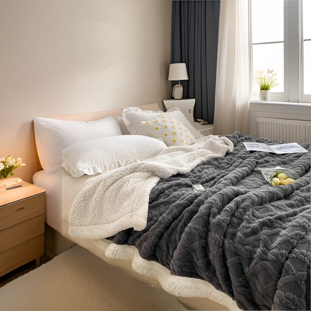 Dobbelsidet vinter fleeceplaid i lammeskindslook