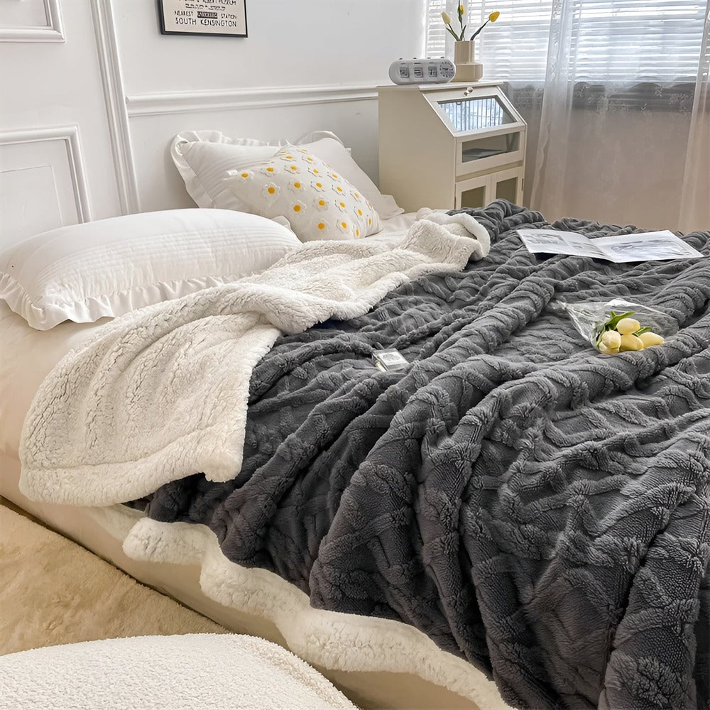 Dobbelsidet vinter fleeceplaid i lammeskindslook