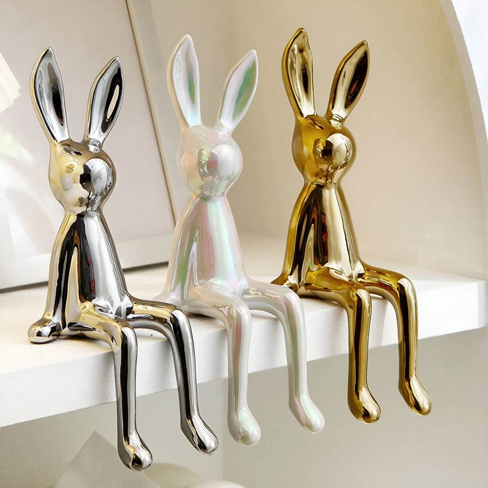 Dekorativ kaninfigur i guld keramik – elegant pynt til hjemmet