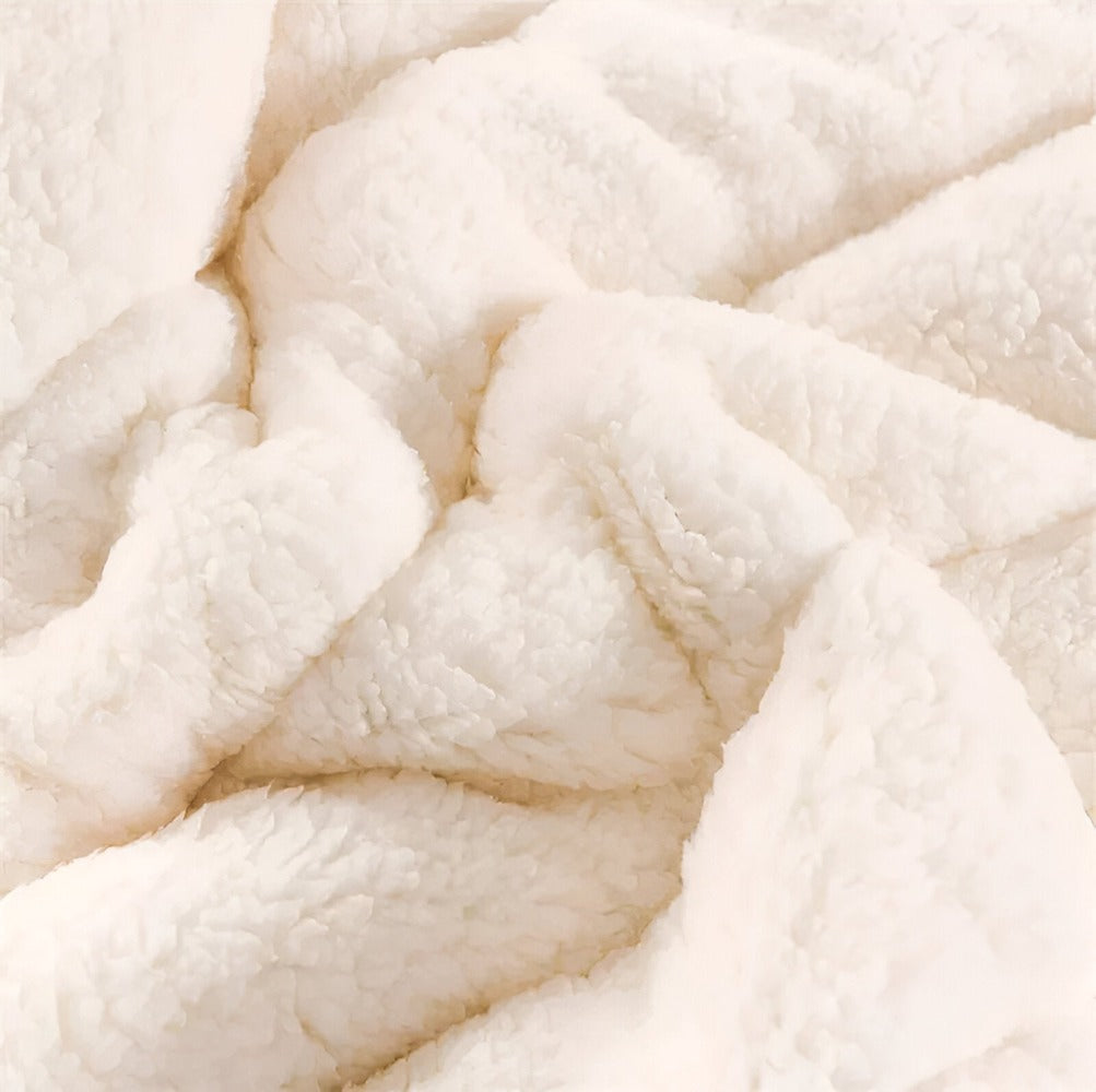 Sherpa fleece tæppe – superblødt og varmt plaid til sofa og seng