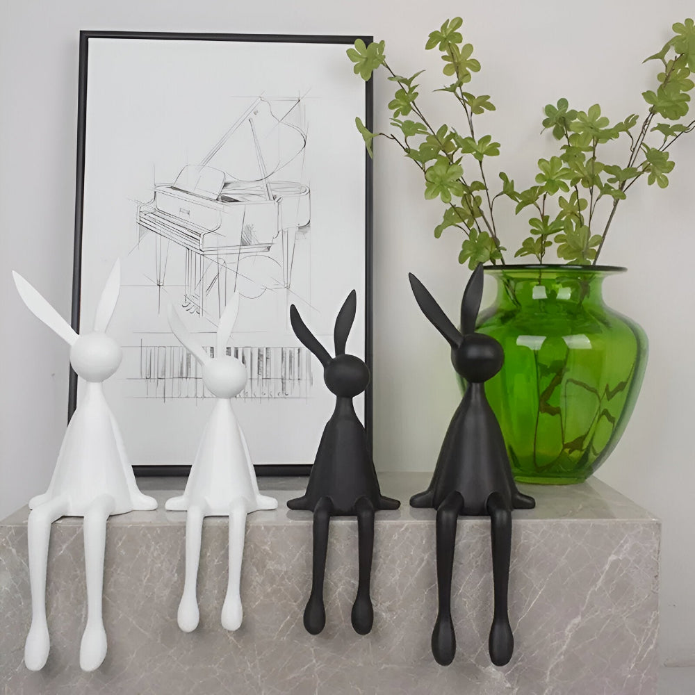 Dekorativ påskehare i moderne design – elegant siddende figur i resin