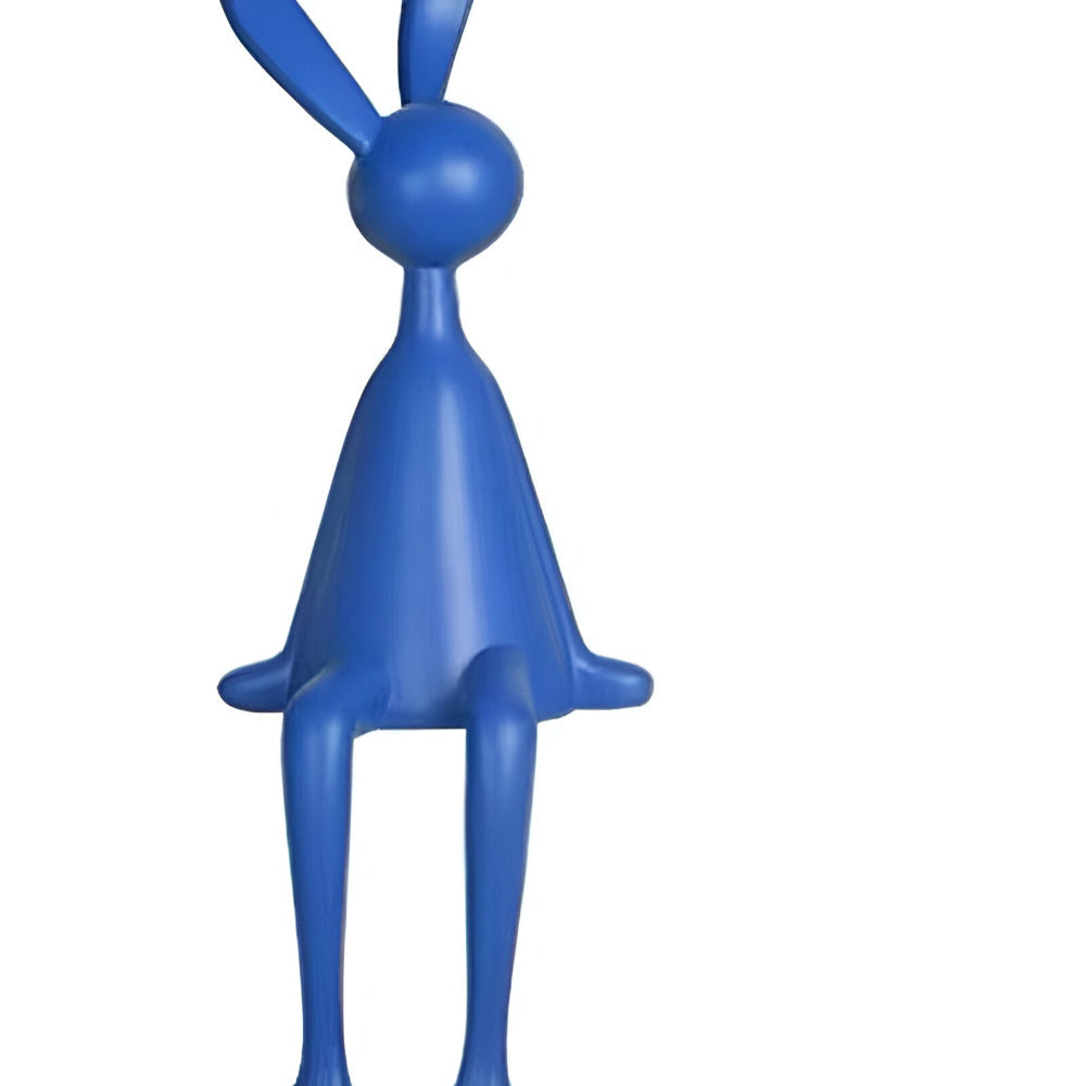 Dekorativ påskehare i moderne design – elegant siddende figur i resin