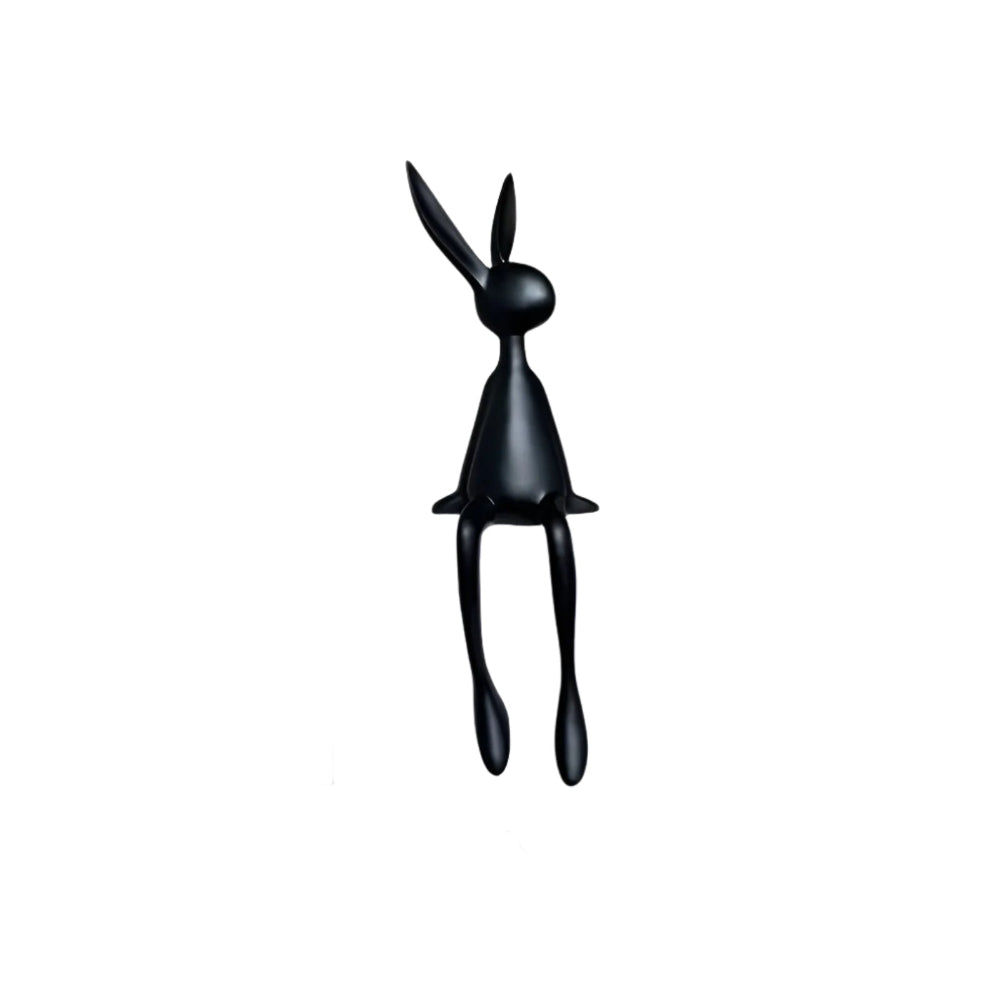 Dekorativ påskehare i moderne design – elegant siddende figur i resin