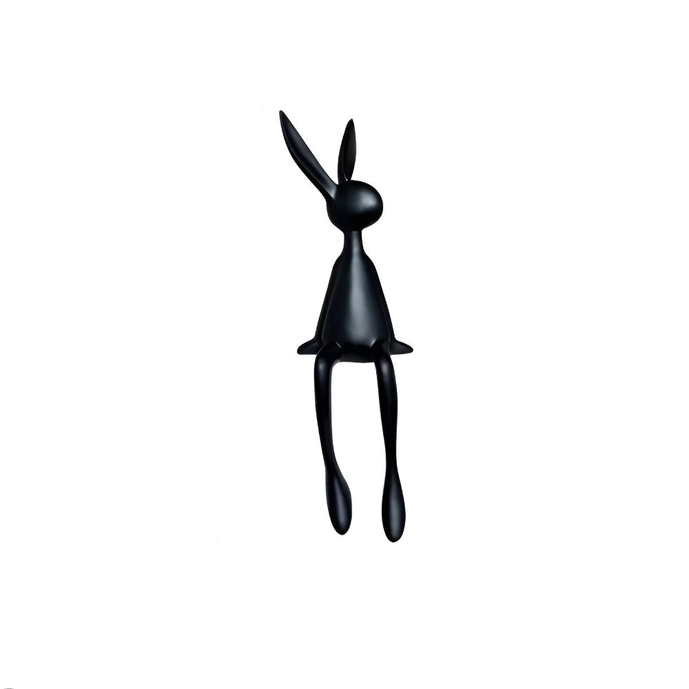 Dekorativ påskehare i moderne design – elegant siddende figur i resin