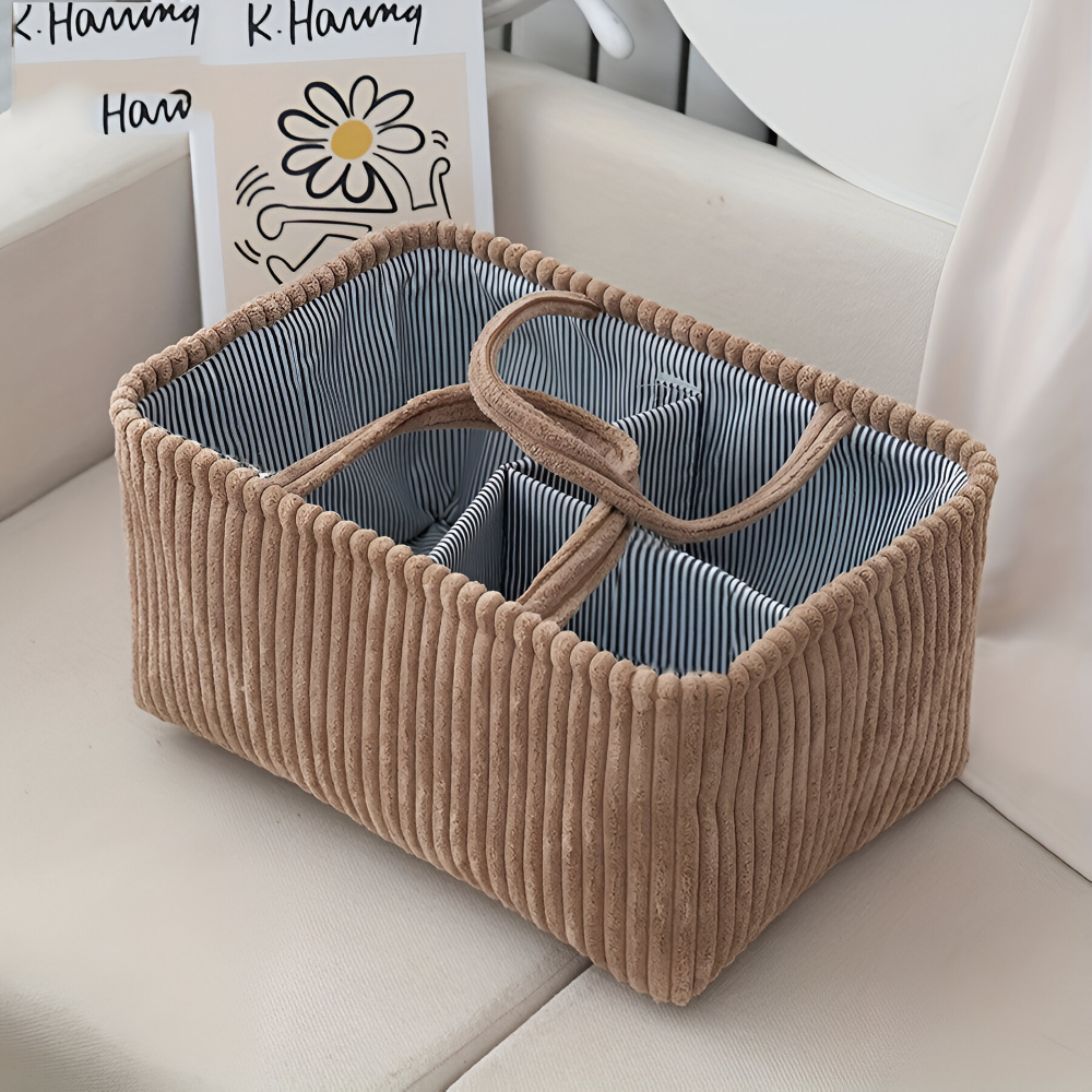 Opbevaringskurv med rum til bleer og babyartikler