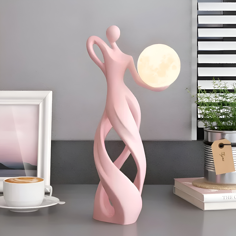 Dekorativ figur lampe i abstrakt design – moderne skulptur med varm belysning