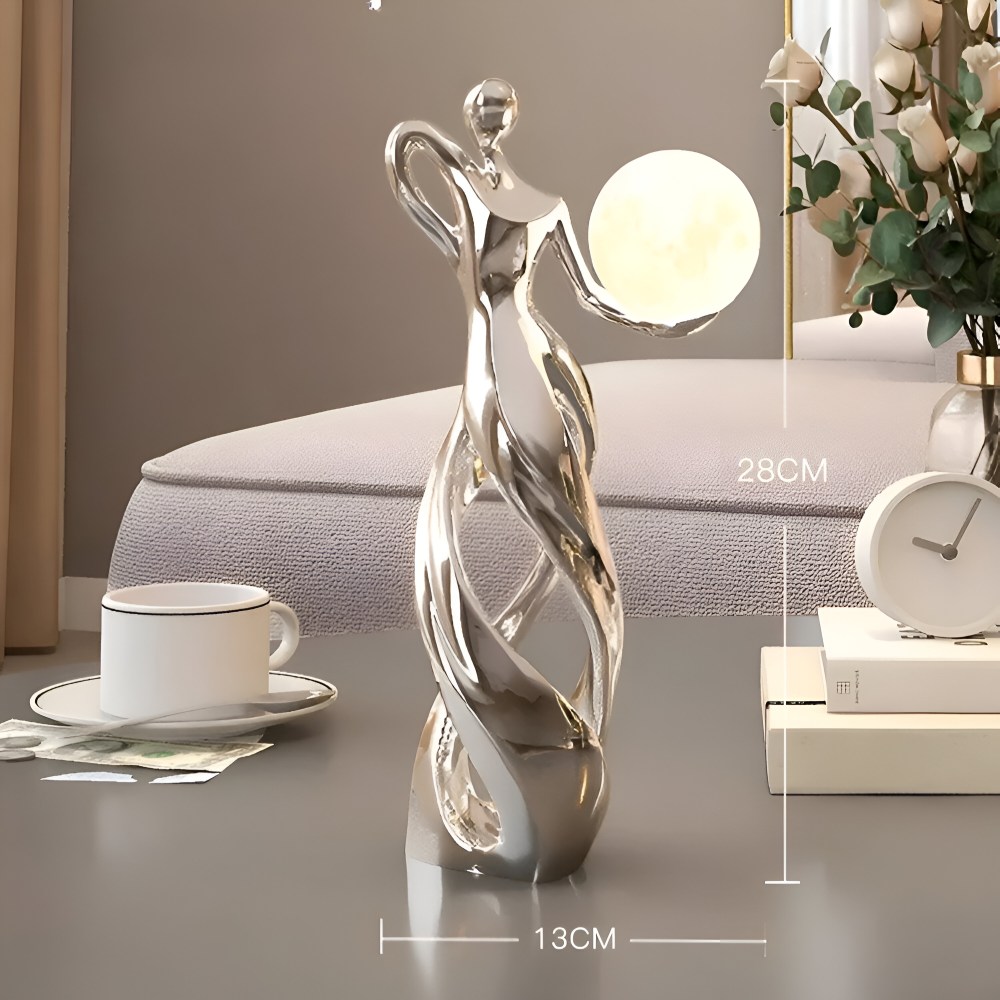 Dekorativ figur lampe i abstrakt design – moderne skulptur med varm belysning