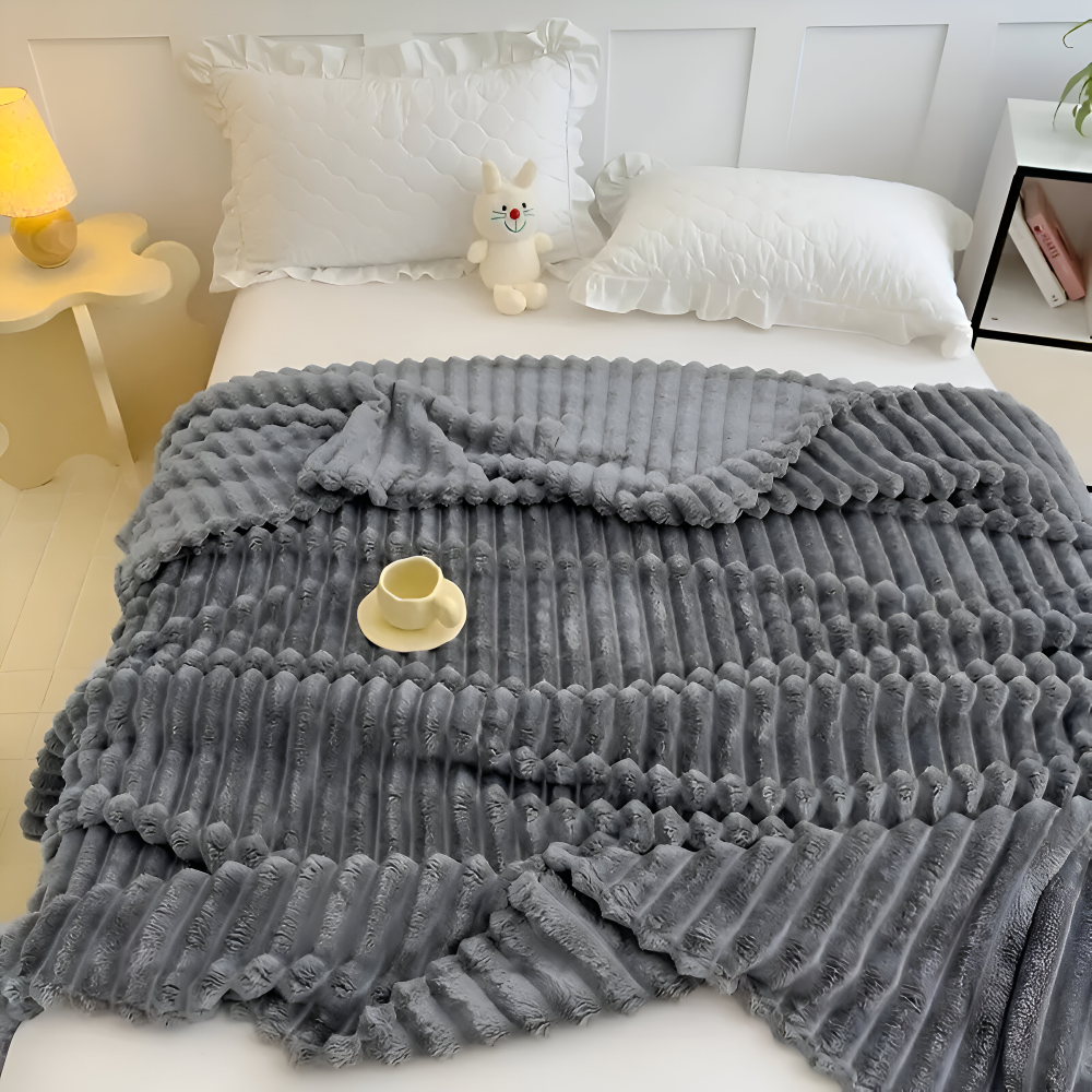 Tyk ribbet fleeceplaid til sofa og seng