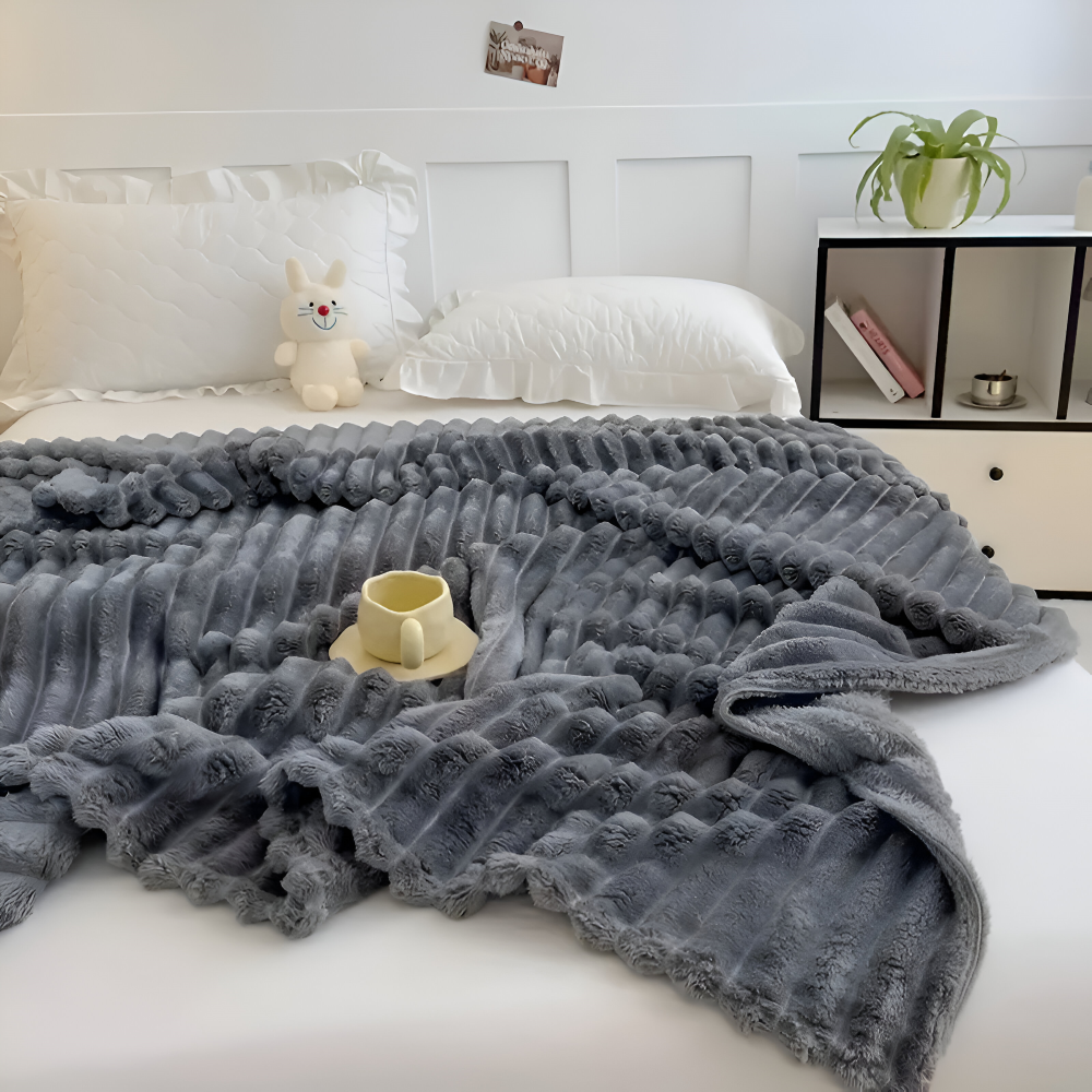 Tyk ribbet fleeceplaid til sofa og seng