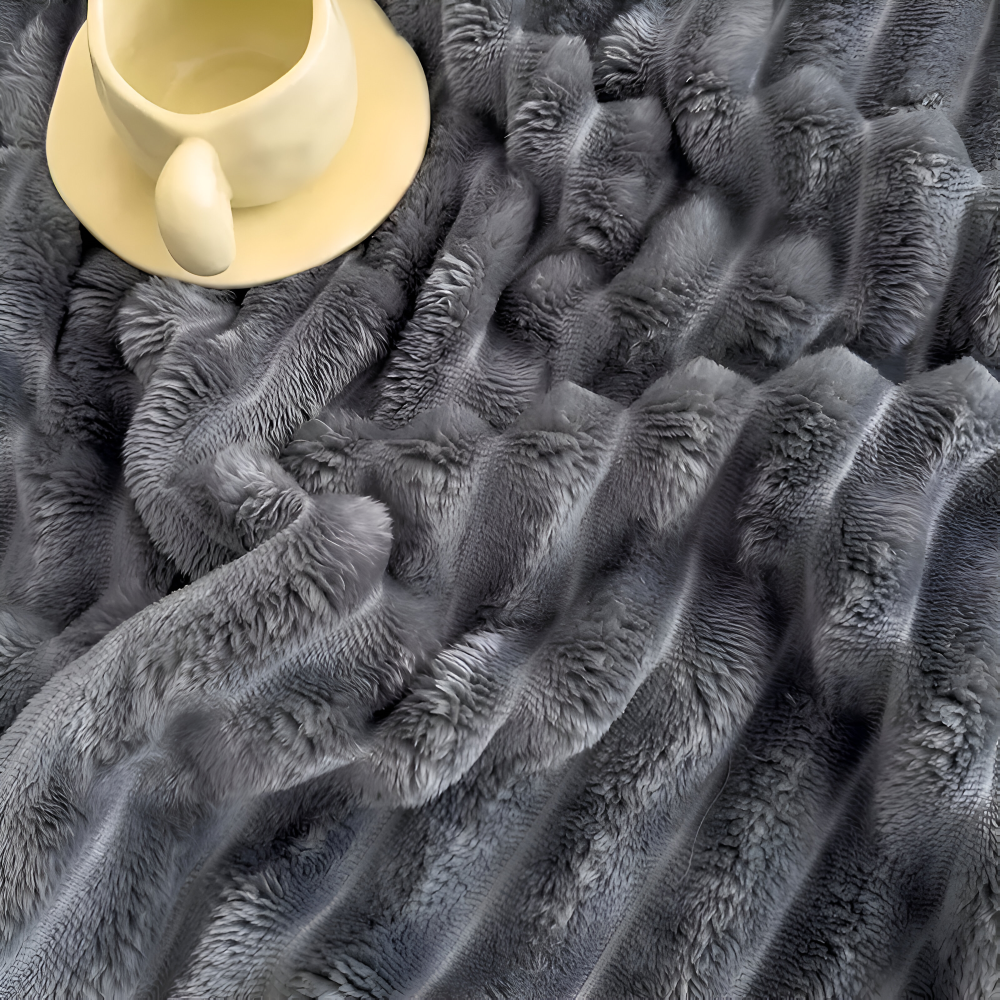 Tyk ribbet fleeceplaid til sofa og seng