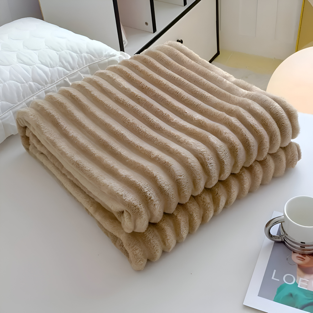 Tyk ribbet fleeceplaid til sofa og seng