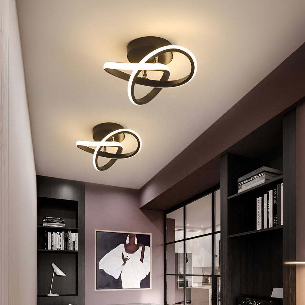 Skulpturel LED-loftlampe med hvirvlende ringe