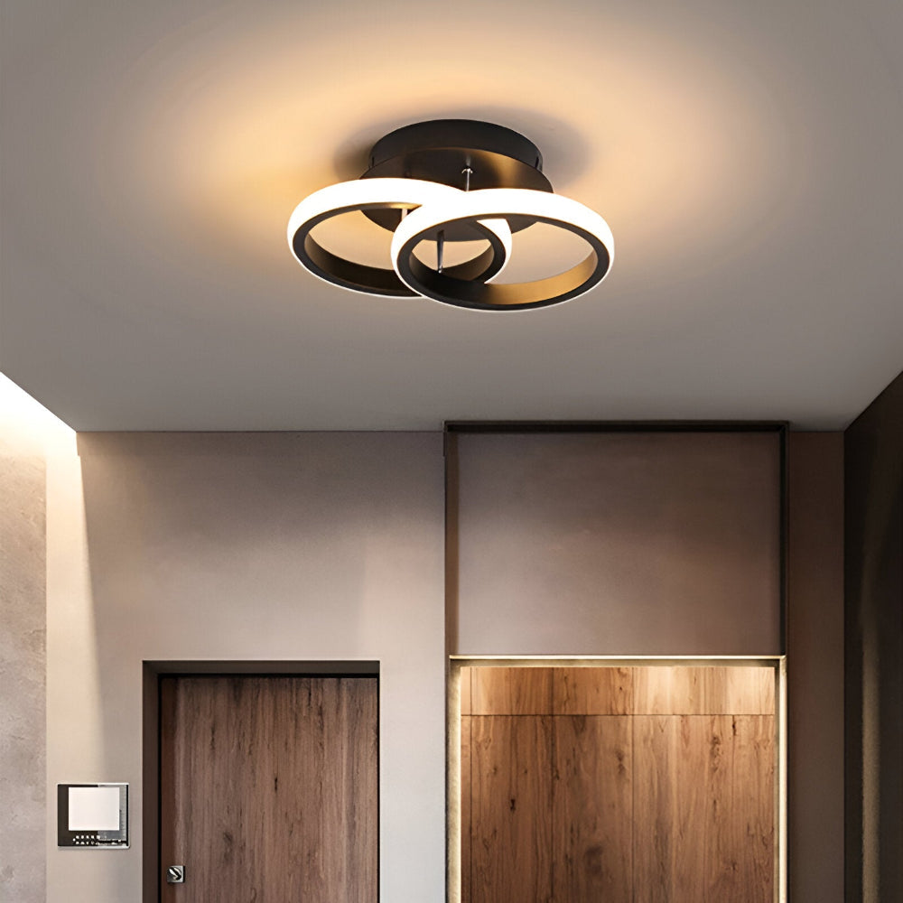 Skulpturel LED-loftlampe med hvirvlende ringe
