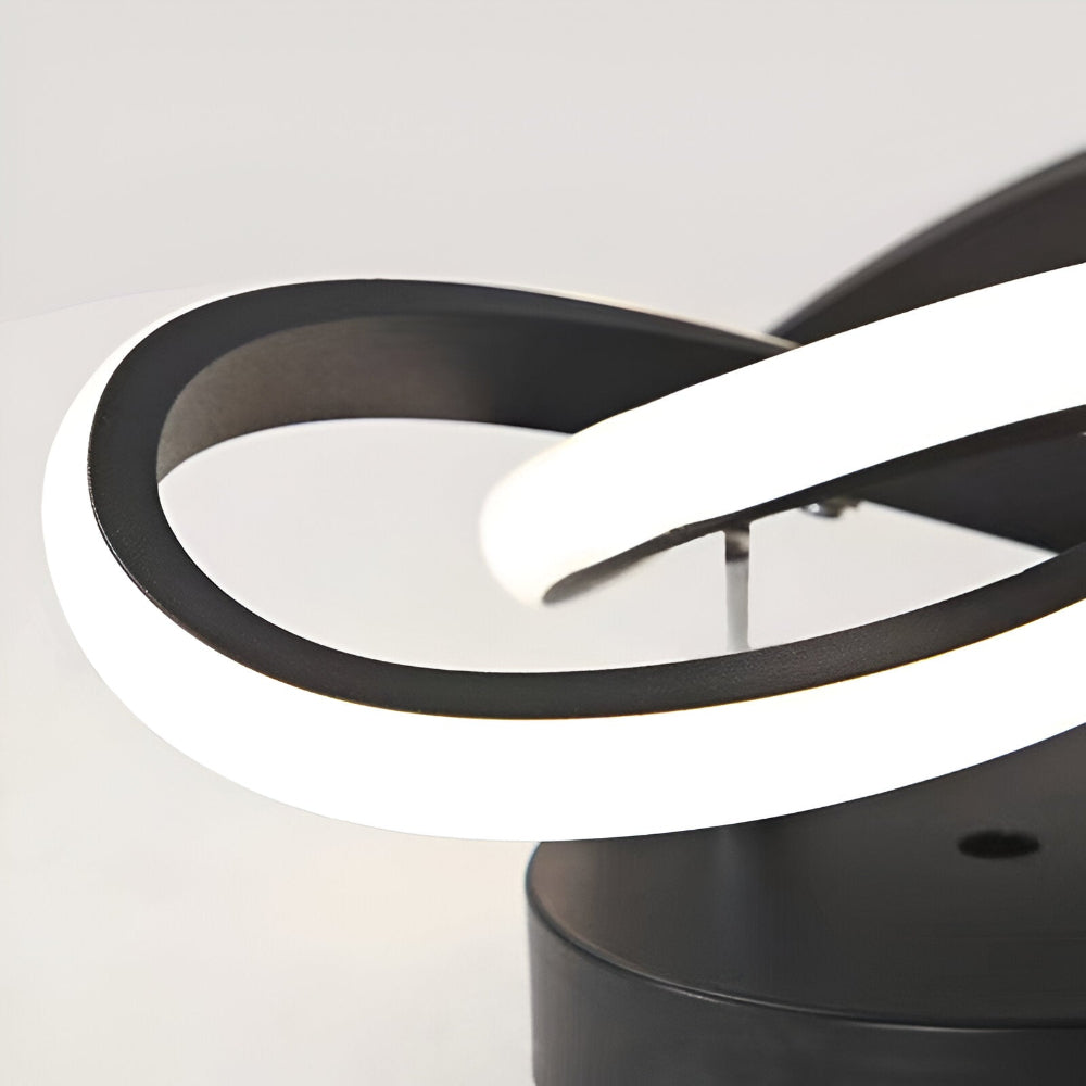 Skulpturel LED-loftlampe med hvirvlende ringe